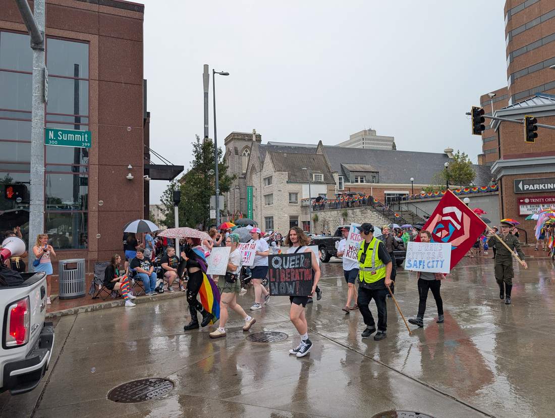 12:18 P.M. — NORTH SUMMIT STREET: THE MARCHING BLOC