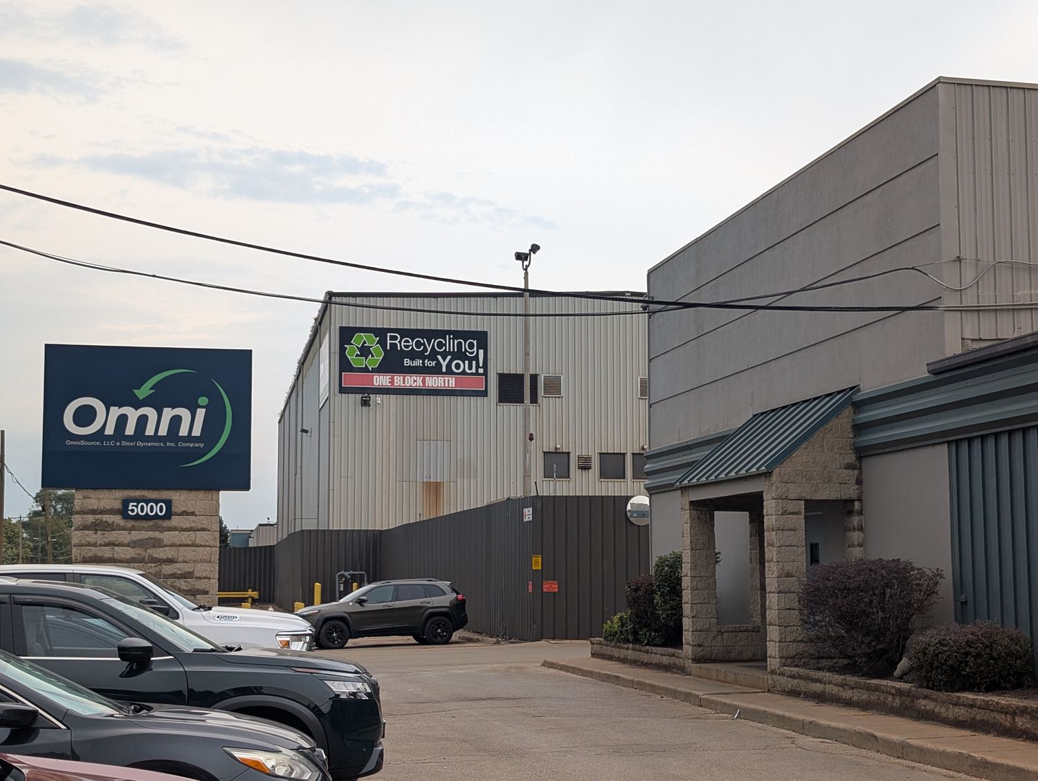 The monument sign at OmniSource, 5000 North Detroit Avenue, Toledo, reading OmniSource, LLC, a Steel Dynamics, Inc. Company